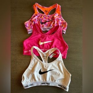 Nike pro sports bras , youth large